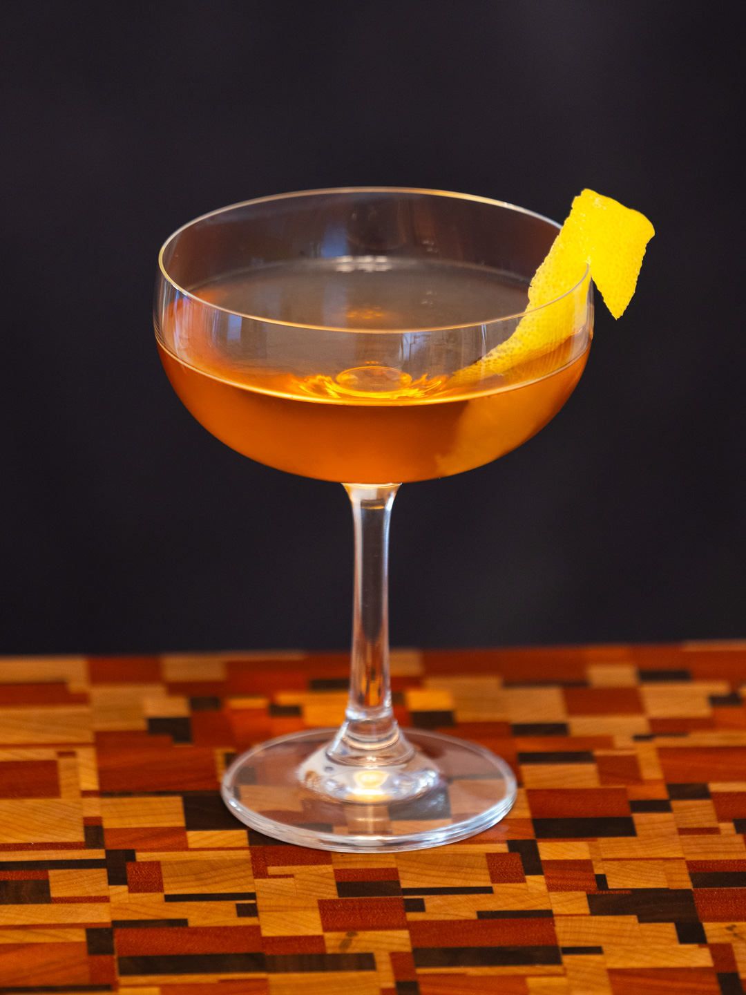 The alice mine cocktail in a coupe glass