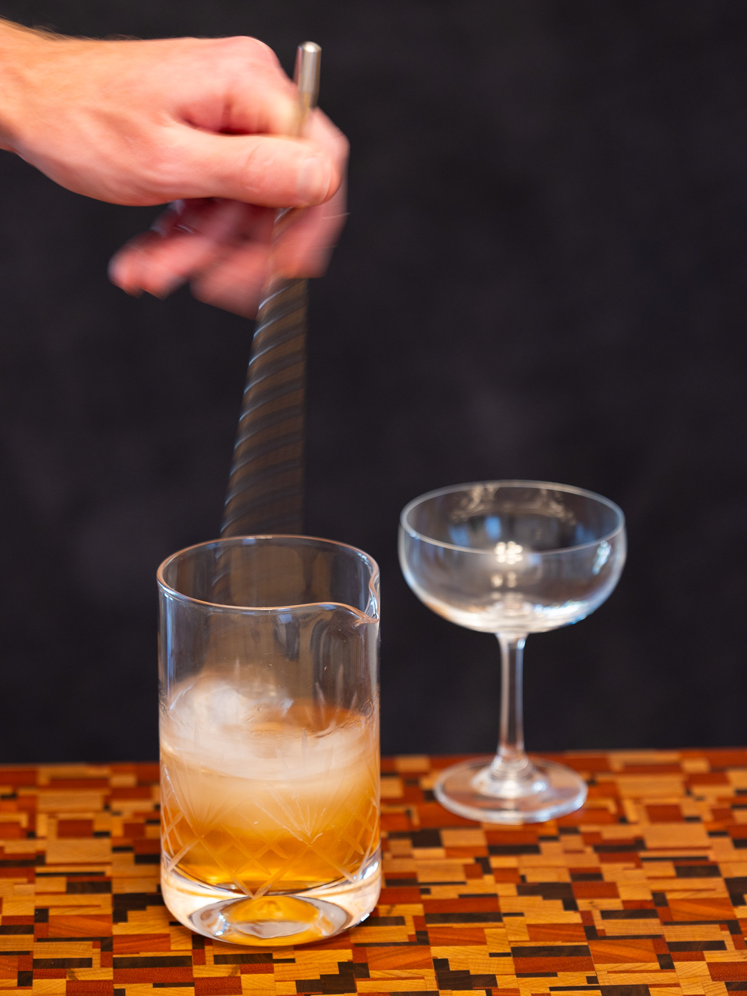 Stirring the cocktail