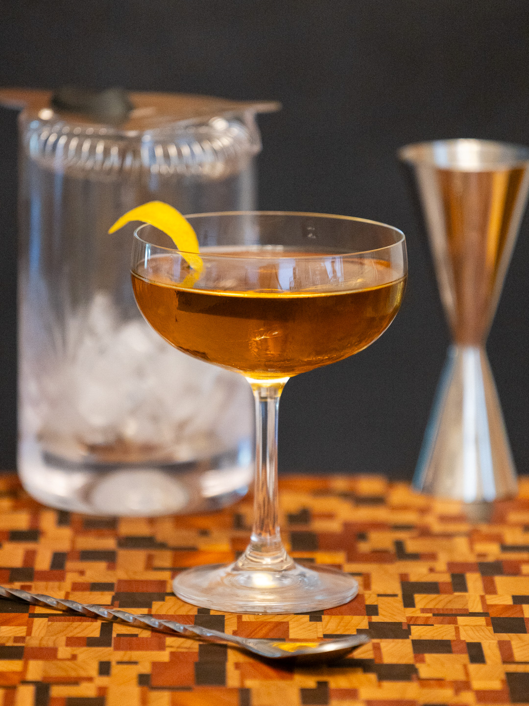 The ampersand cocktail in a coupe glass