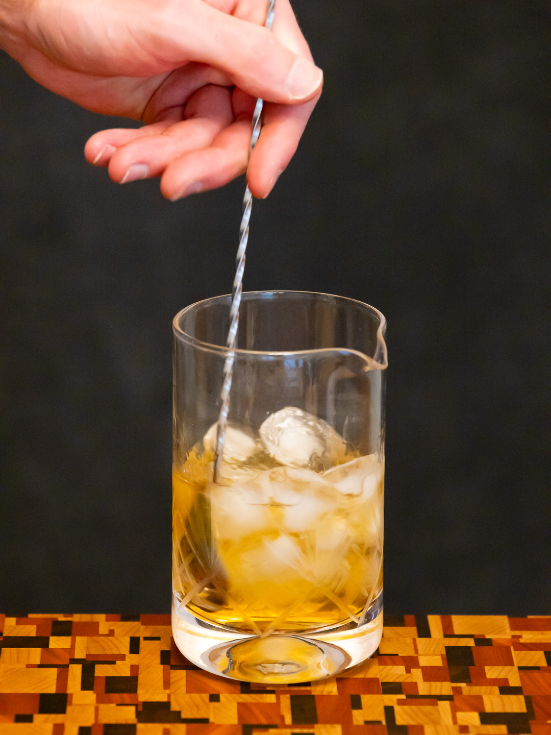 Stirring the cocktail