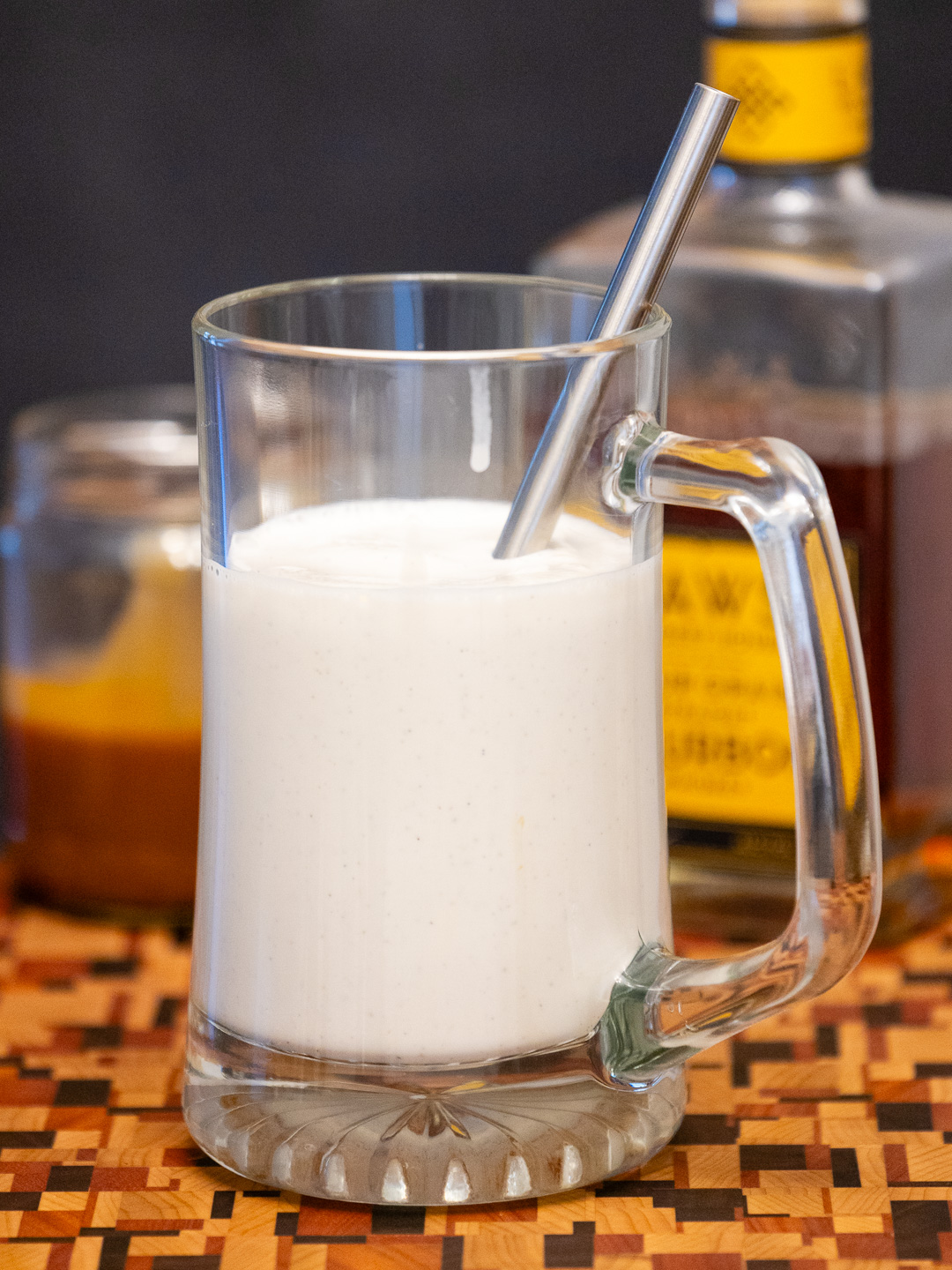 The bourbon and salted caramel milkshake in a glass mug