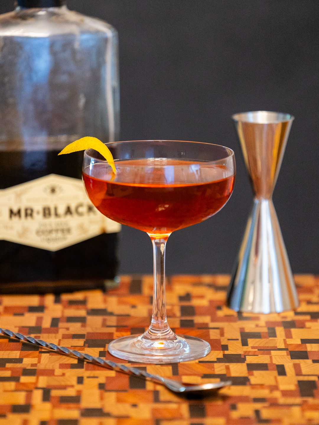 The Coffee Rye Boulevardier cocktail in a coupe glass