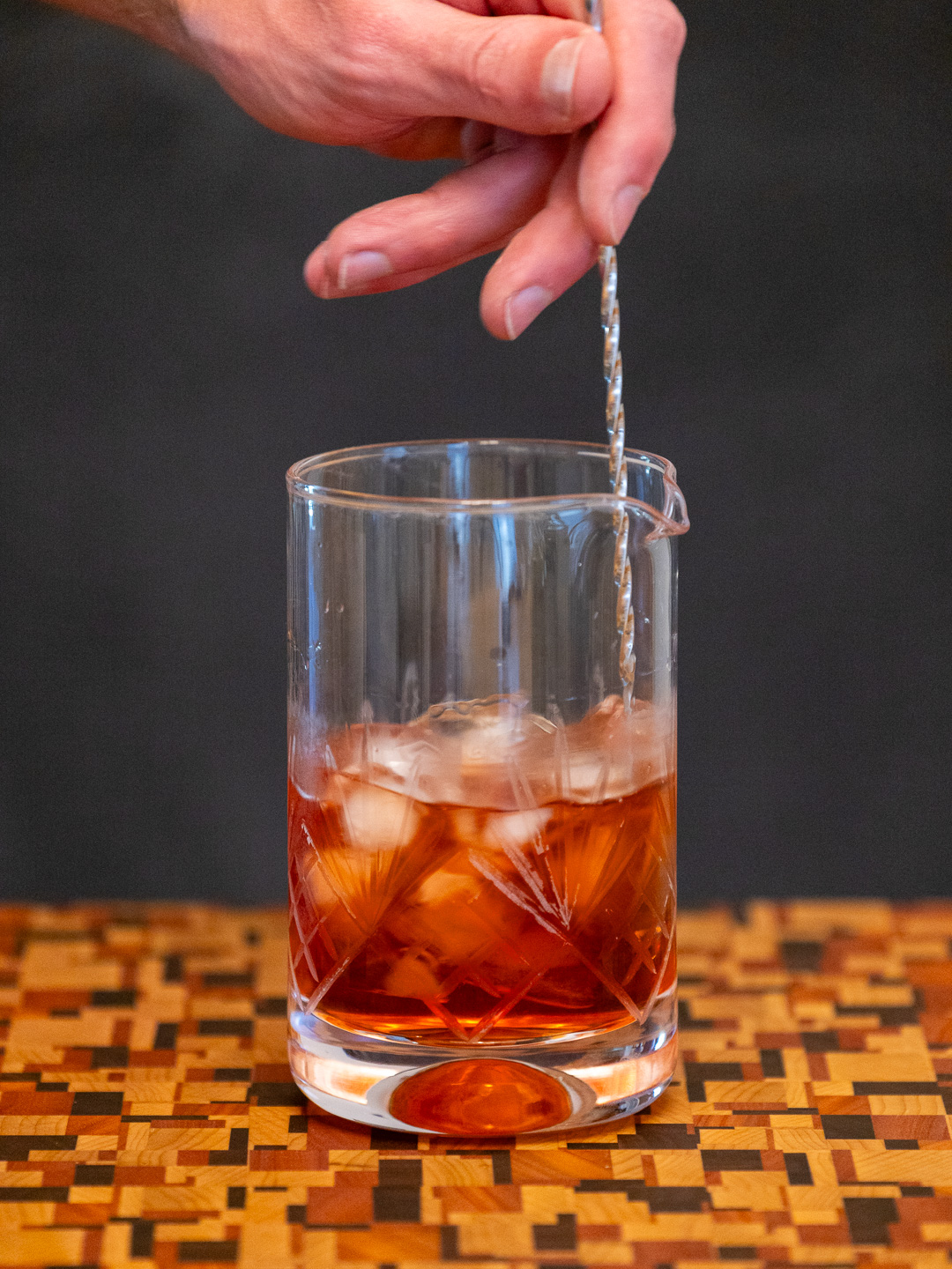 Stirring the cocktail